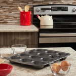 Load image into Gallery viewer, Baker’s Secret Essentials 12-Cup Non-Stick Steel Muffin Pan $8.00 EACH, CASE PACK OF 12

