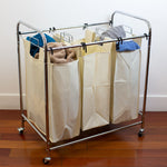 Load image into Gallery viewer, Home Basics Triple Rolling Canvas Laundry Sorter, Natural $40.00 EACH, CASE PACK OF 4
