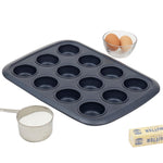 Load image into Gallery viewer, Michael Graves Design Textured Non-Stick 12 Cup Non-Stick Carbon Steel Muffin Pan, Indigo $8 EACH, CASE PACK OF 12
