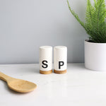 Load image into Gallery viewer, Home Basics Ceramic Salt and Pepper Shaker Set with Bamboo Accents, White
 $3.00 EACH, CASE PACK OF 24
