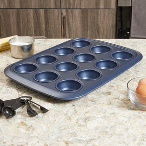 Michael Graves Design Textured Non-Stick 12 Cup Non-Stick Carbon Steel Muffin Pan, Indigo $8.00 EACH, CASE PACK OF 12