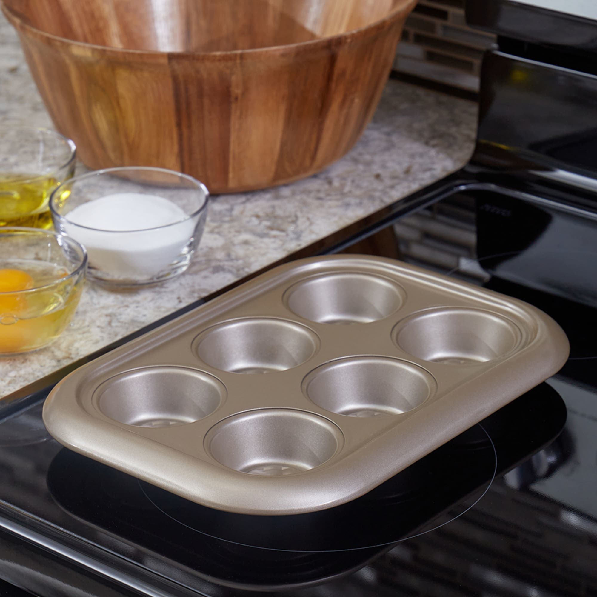 Home Basics Aurelia Non-Stick 6-Cup Carbon Steel Muffin Pan, Gold $5.00 EACH, CASE PACK OF 12
