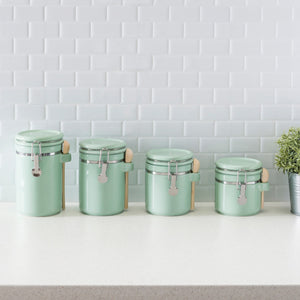 Home Basics 4 Piece Ceramic Canisters with Easy Open Air-Tight Clamp Top Lid and Wooden Spoons, Mint $20.00 EACH, CASE PACK OF 2