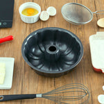 Load image into Gallery viewer, Home Basics Fluted Non-Stick Cake Pan $5.00 EACH, CASE PACK OF 12
